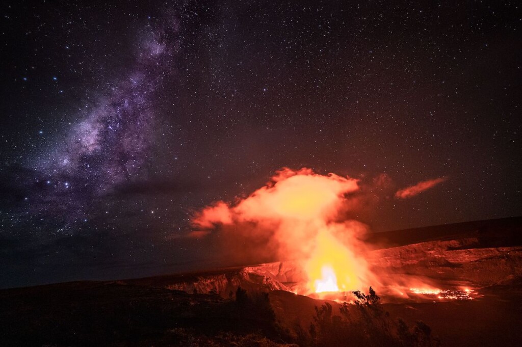 Scenic View Of A Steaming Kilauea Volcano Under A Beautiful Starry Night Sky On Big Island, Hawaii
