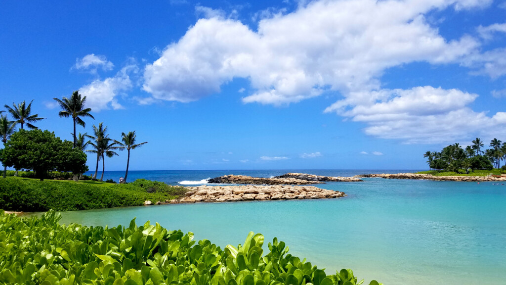 Ko Olina Lagoon, One Of The Most Picturesque Lagoons With Palm Trees, Blue Sky, And Emerald Color Water.