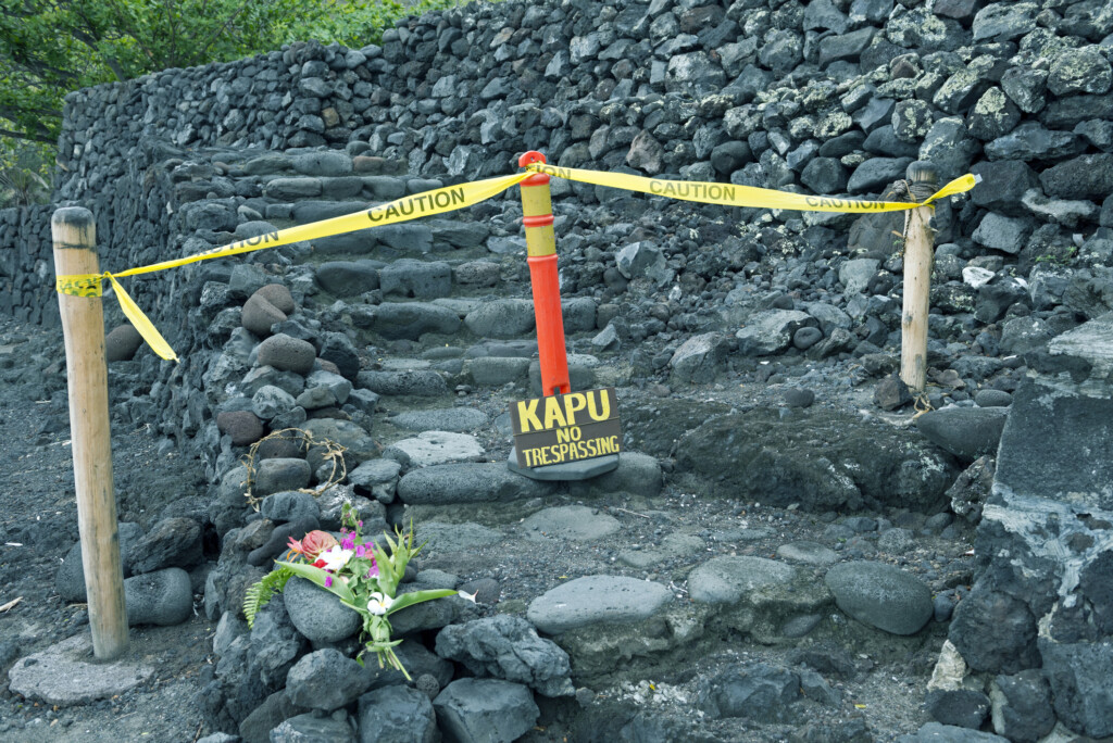 Flower Offering At Ancient Hawaiian Heiau Or Temple